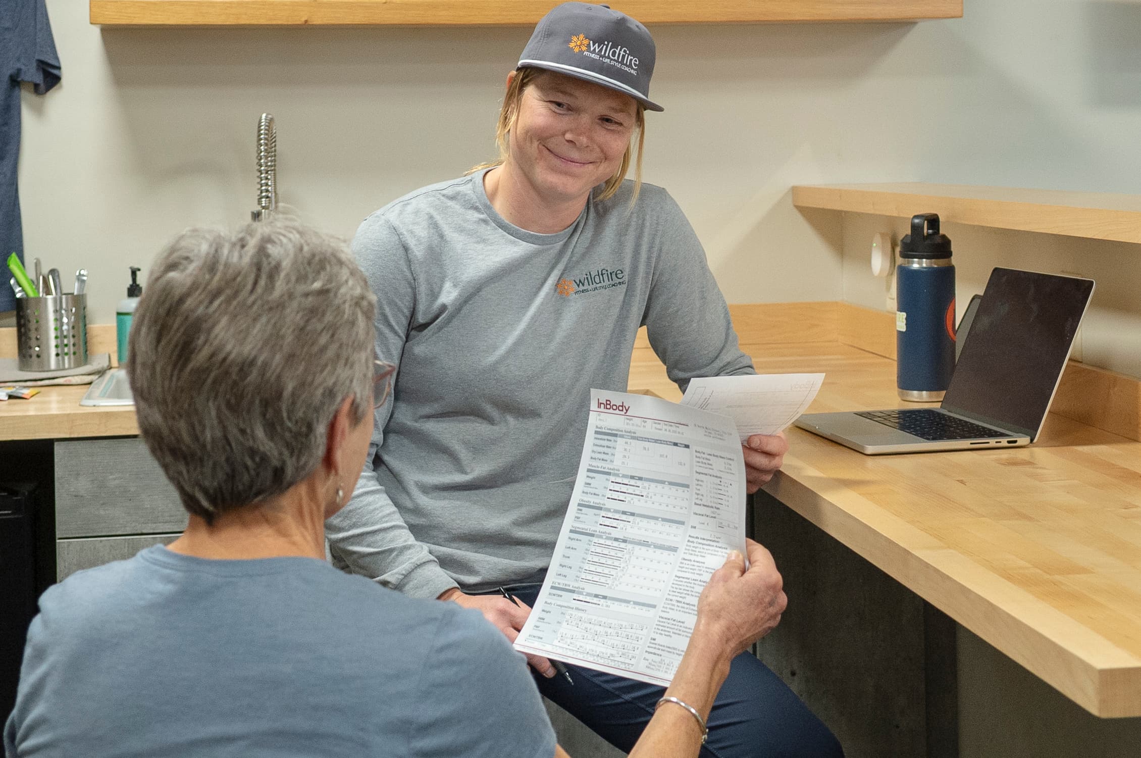 Lacey working with client for physical training and fitness at wildfire coaching